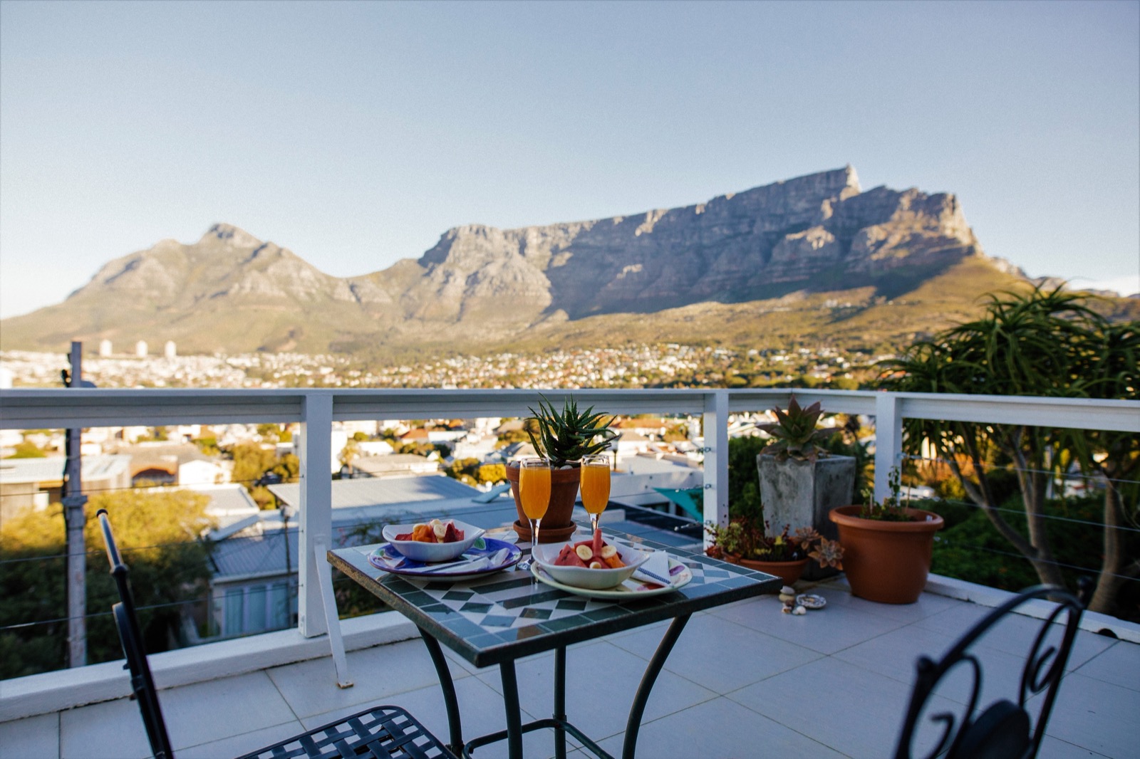 Breakfast on the balcony, Table Mountain beyond